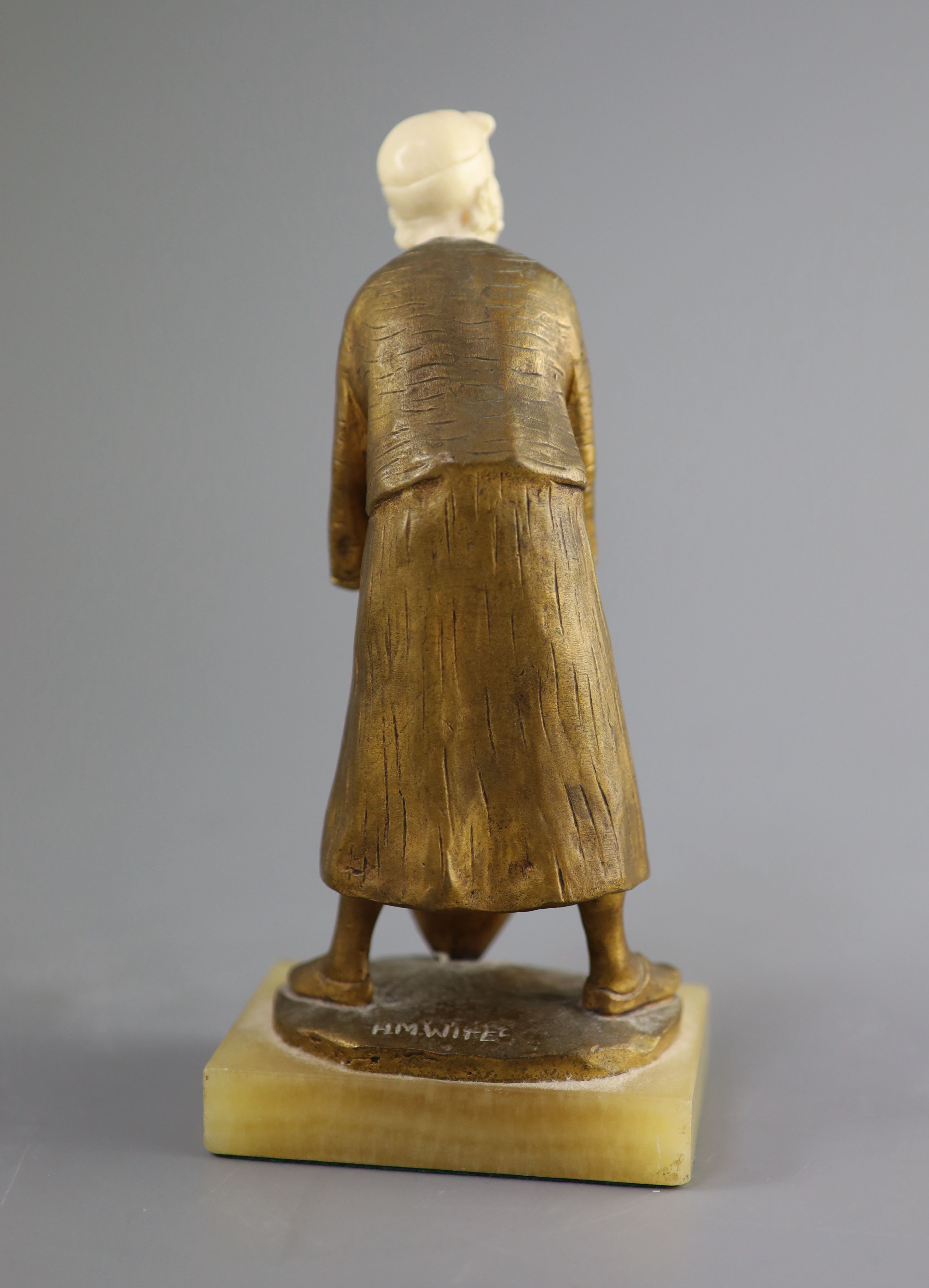 Hélène Maynard White (American, b.1870). A bronze and ivory study of an African girl with amphora base, c1920, 19cm high